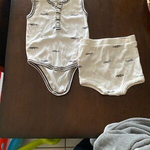 Kate Quinn airplane Baby Bodysuit